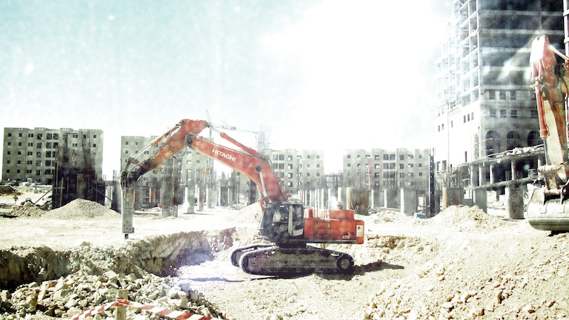 Palestijnen zijn hard aan het werk in Rawabi. Foto: © Alfred Muller 