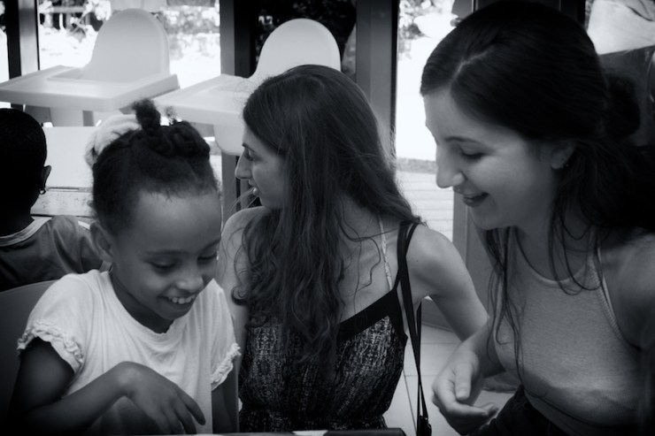 Canadian volunteers working with children in the home of Save a Child's Heart.